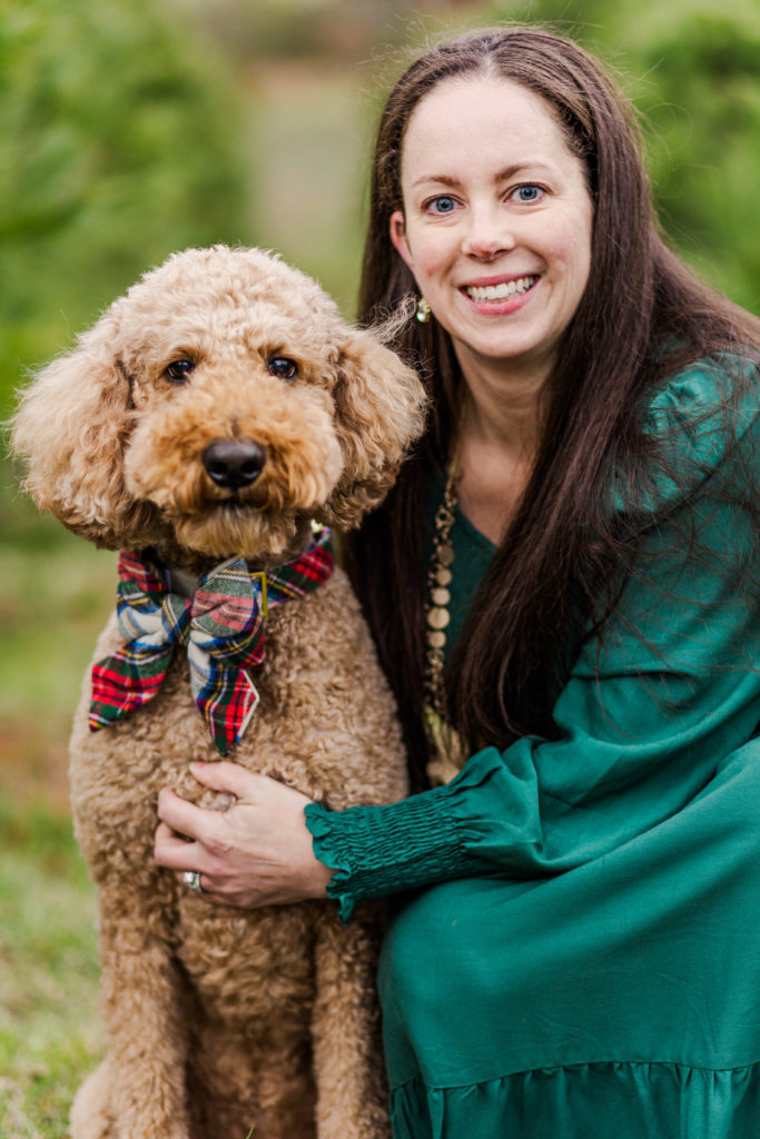 Goldendoodle with owner for Christmas session